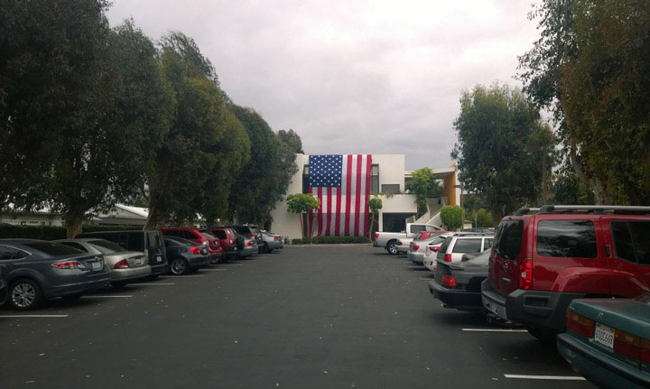 Giant American flag in front of the GC office