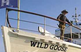 Man sitting on a yacht