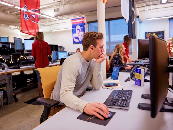 GC team member working at computer