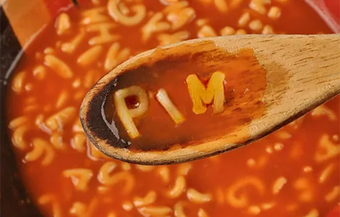 PIM Acronym in Spoon of Alphabet Soup